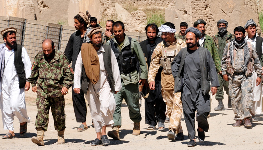 Taliban insurgents turn themselves in to Afghan National Security Forces at a forward operating base in Puza-i-Eshan